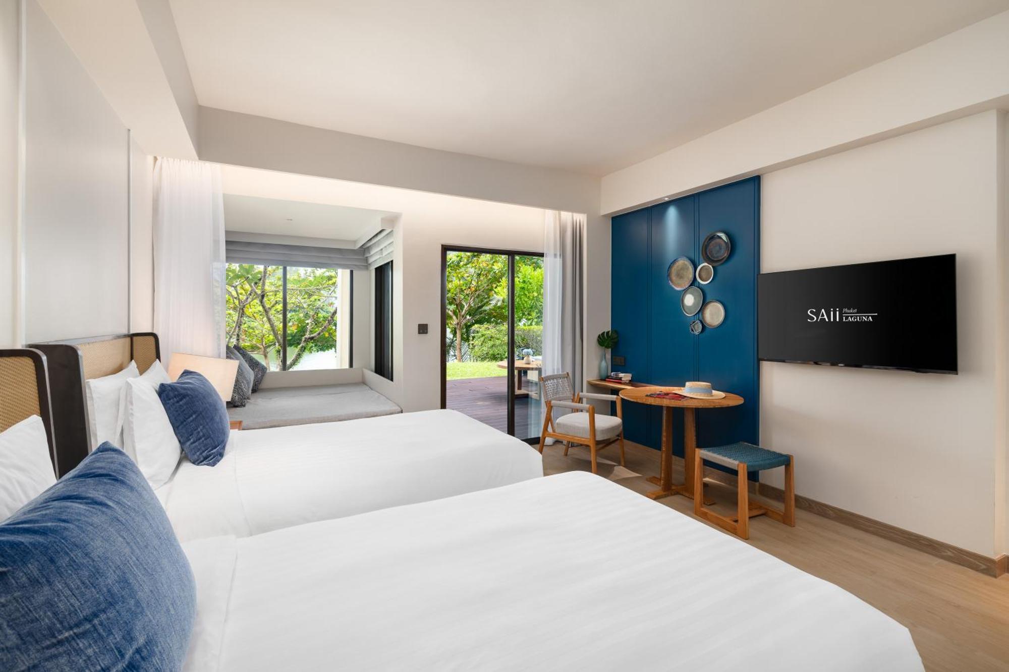 منتجع أوتريجر لاجونا بيتش فوكيت شاطئ بانغ تاو المظهر الخارجي الصورة Deluxe Room